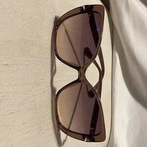 New in case Guess purple - pinkish large rim 2” with logo n gold accents on